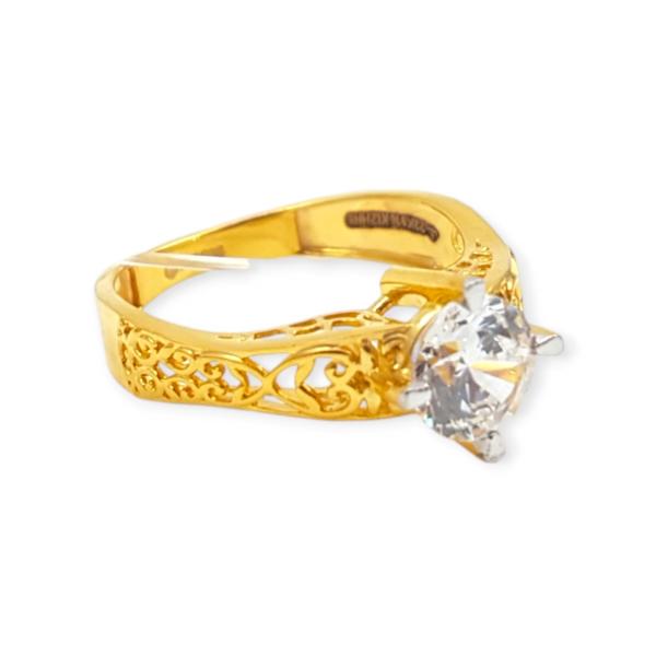 Gold Ladies Ring with Solitaire and Beautiful Design